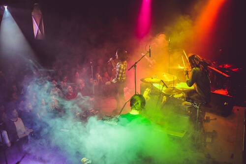 Rainbow stage lights at a concert