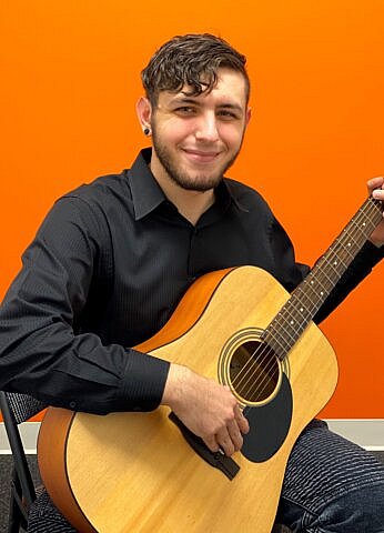 Anthony Villani, Guitar and Bass teacher at Center Stage Music Center.